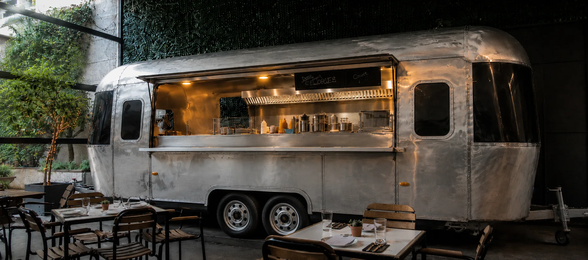 Concept scene of a silver Diner Aero trailer in an indoor dining setting